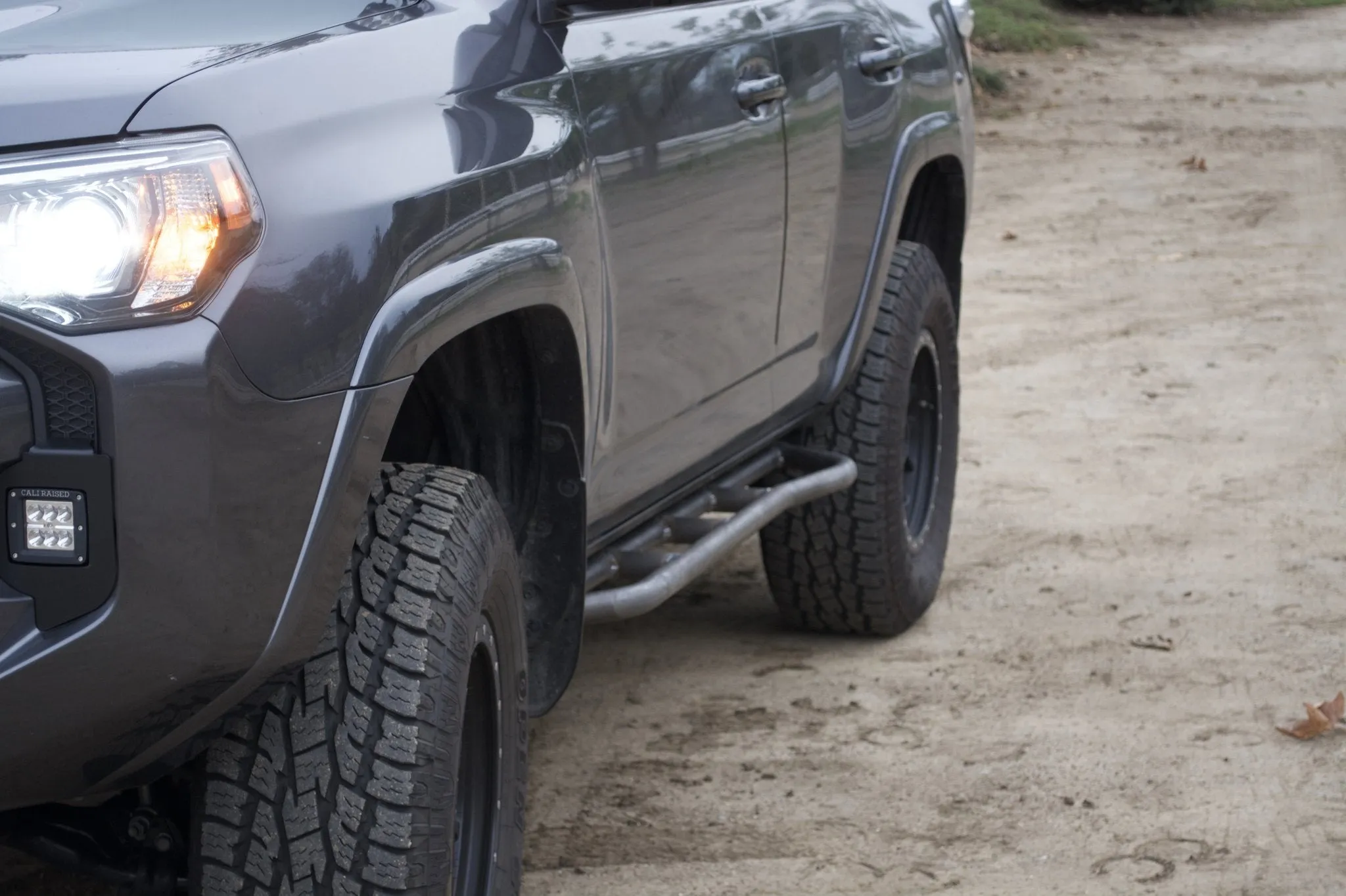 Cali Raised LED 2010-2024 Toyota 4Runner Step Edition Bolt On Rock Sliders